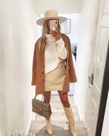 Botas altas de cuero de Lauren Watson en la cuenta de Instagram @laurenxwatsonnn