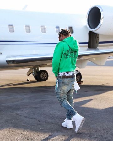 Les sneakers montantes nike blanches portées par Slim Jxmmi sur le compte Instagram de @slimjxmmi