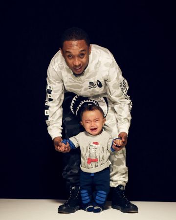 The pants camo black and beige with shark teeth worn by Slim Jxmmi on the account Instagram of @slimjxmmi