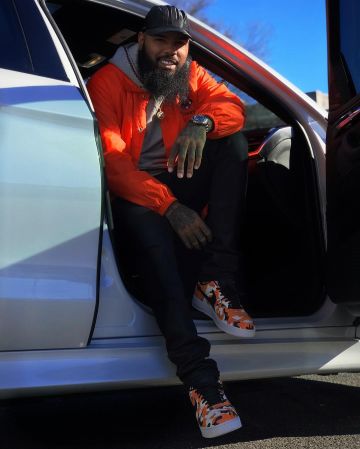 Sneakers nike white and black camo orange worn by Stalley on the account Instagram of @stalley