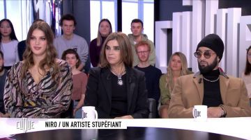 Le bonnet noir porté par Niro dans l'émission Clique du 29 novembre 2019