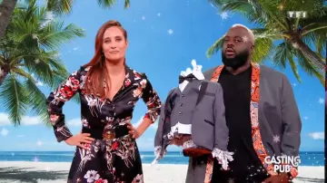 The belt black leather buckle round Julie Debona in It's Christmas everything is allowed 