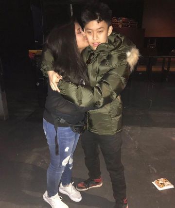 Sneakers nike black, red and white worn by Rich Brian on the account Instagram of @brianimanuel