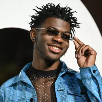 Oversize T-shirt with tulle shiny Lil Sin X on the account Instagram of @lilnasx