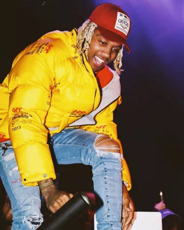 Off-white Print Yel­low Puffer Jack­et of Lil Durk on the Instagram account @durkioworld