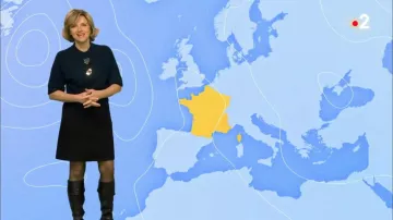 Suéter corto abotonado azul medianoche de Valérie Maurice en Météo de France 2