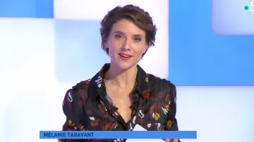 The black shirt is adorned with stripes in transparency on floral print of Melanie Taravant in C to say