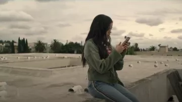 Rainbow side stripe denim jeans worn by Ellie (Jenna Ortega) in YOU Season 2 Episode 1