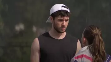 Lacoste side logo baseball cap in white worn by Forty Quinn (James Scully) in YOU Season 2 Episode 3