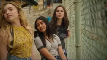 Grey Po­lo Shirt worn by Alex Portnoy (Brianne Tju) in Light as a Feather Season 2 Episode 8