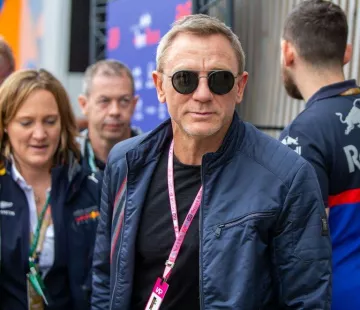 Navy blue bomber Jacket worn by Daniel Craig on the set of No Time To Die