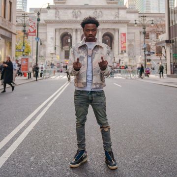 Polo Ralph Lauren Blanc encolure ras du cou Maillot de Roddy Ricch sur l'Instagram account @roddyricch