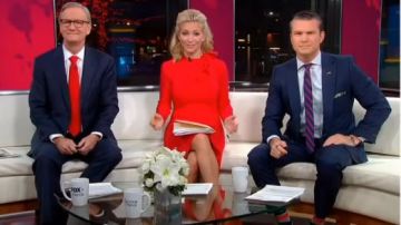 Red Tie Neck Pleat­ed Drop Waist Dress worn by Ainsley Earhardt in Fox & Friends