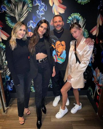 Nike Air Force Sneak­er worn by Hailey Baldwin Papi Steak Miami January 3, 2020