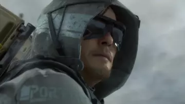 The trademark gold mask of Troy Baker in the Death Stranding