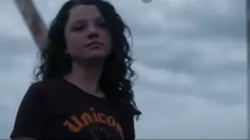 Uni­corn Tee worn by Rebecca Iguero (Stefania LaVie Owen) in Messiah Season 1 Episode 2
