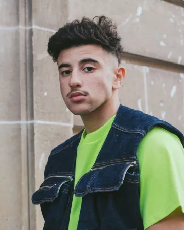 The jean jacket without sleeves that is worn by Just Riadh on his account Instagram @justriadh
