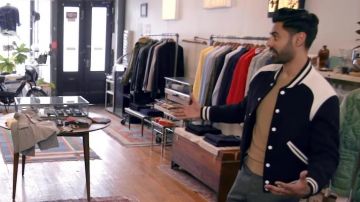 Black and white varsity jacket worn by Hasan Minhaj in Patriot Act