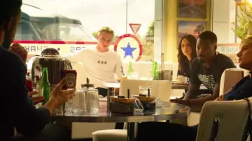 The white t-shirt long sleeve "10 10 10" carried by Four / 4 (Ben Hardy) in 6 Underground
