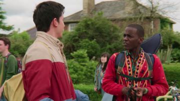 Red printed cardigan jacket worn by Eric Effoing (Ncuti Gatwa) in Sex Education (Season 2)