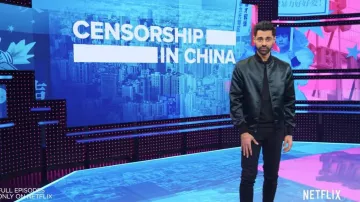 Black bomber jacket of Himself - Host (Hasan Minhaj) in Patriot Act with Hasan Minhaj (S02E01)