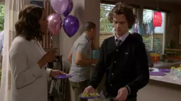 Comme des Garçons Black Heart Patch V-Neck Cardigan worn by Dr. Spencer Reid (Matthew Gray Gubler) as seen in Criminal Minds (S15E01)