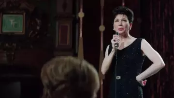 Black shine dress of Judy Garland (Renée Zellweger) in Judy