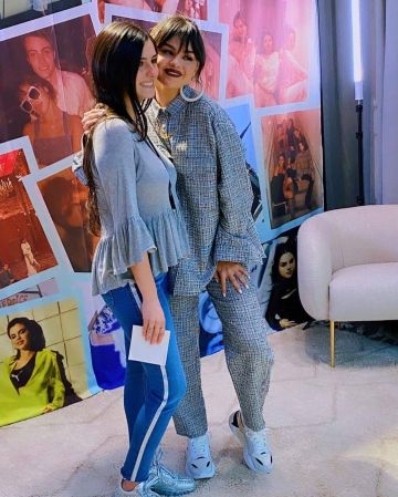 Totême Hound­stooth Straight Leg Trousers worn by Selena Gomez Puma Flagship Store January 14, 2020