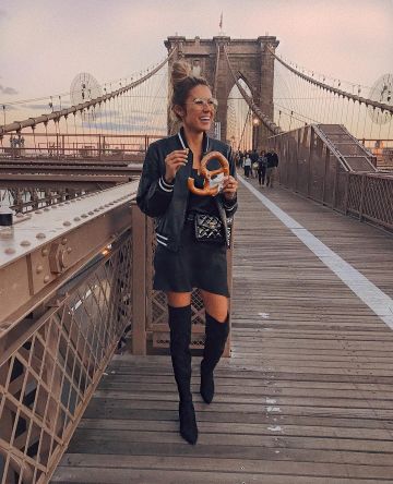 Alice + Olivia Leather Bomber Jack­et of Christine on the Instagram account @christineandrew