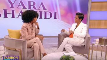 Nanushka Chi­mo Belt­ed Ve­g­an Leather Wide-leg Pants worn by Yara Shahidi on Tamron Hall Show January 14, 2020