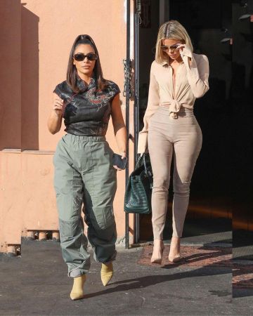 Versace Black Medusa Big­gie Sun­glass­es worn by Kim Kardashian Emilio’s Trattoria January 16, 2020