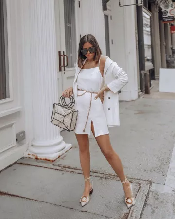 Bolso de mango raphia bitono de Tiffany Jais en la cuenta de Instagram de @flauntandcenter