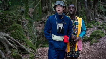 The rain jacket tri-color blue yellow pink Eric Effoing (Ncuti Gatwa) in Sex Education Season 2