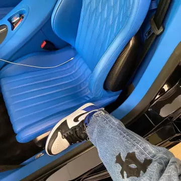 Chrome Hearts Washed Blue Cross Patch Denim Jeans of Travis Scott on the Instagram account @travisscott