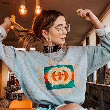 Gucci grey jumper worn by Zoe Sugg on her Instagram account @zoesugg