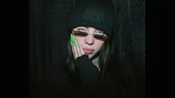 EVEN GOD HER­SELF HAS enemies worn by Billie Eilish in Billie Eilish - Funny Moments