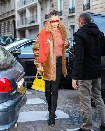 Wandler Isa An­kle Boots worn by Bella Hadid Paris January 20, 2020