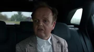 White shirt of Newman (Toby Jones) in Normandy Naked