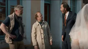 Trench coat beige Newman (Toby Jones) in Normandy Naked