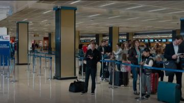 Sweater has collar-zipped Newman (Toby Jones) in Normandy Naked