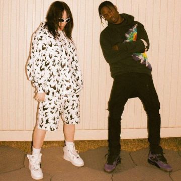 The sweatshirt white with patterned black worn by Billie Eilish with Travis Scott on the account Instagram @billieeilish