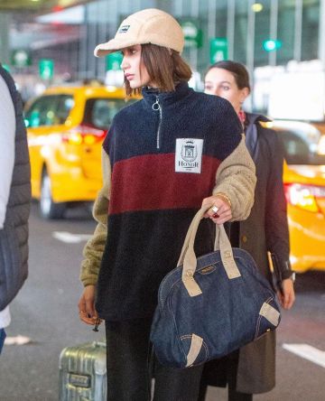 Prada Den­im Lo­go Boston Bag worn by Bella Hadid JFK Airport January 23, 2020