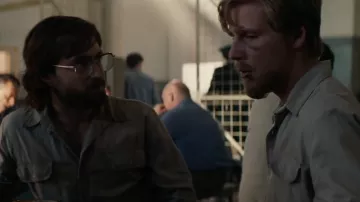 Blue shirt Stephen Lee (Daniel Webber) in Escape from Pretoria