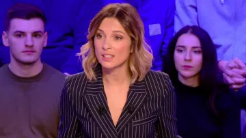 The blue blazer and striped right Isabelle Ithurburu in Canal Rugby Club the 26.01.2020