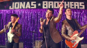 Gold and black blazer of Joe Jonas in Jonas Brothers - What A Man Gotta Do (Official Video)