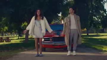 White fluffy coat of Danielle Jonas in Jonas Brothers - What A Man Gotta Do (Official Video)