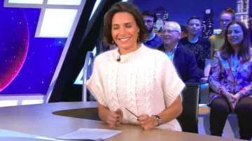 The short pullover, stand up collar and short sleeves of Alessandra Sublet's in It is Canteloup