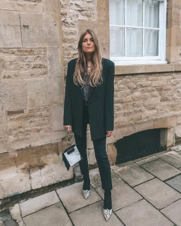 Mezcla botas de calcetín de Sinead en la cuenta de Instagram @sineadcrowe