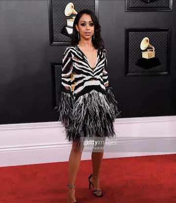 Giuseppe zanotti Crys­tal Em­bell­ished An­kle Strap San­dal of Liza Koshy on the Instagram account @lizakoshy  January 27, 2020