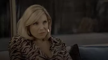 Orange and Black Tiger Print Silk Blouse worn by Brianna Hanson (June Diane Raphael) in Grace and Frankie Season 6 Episode 6
